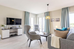 5 Sterne Ferienwohnung Boddenkieker mit großer Eckterrasse und Boddenblick in Wustrow